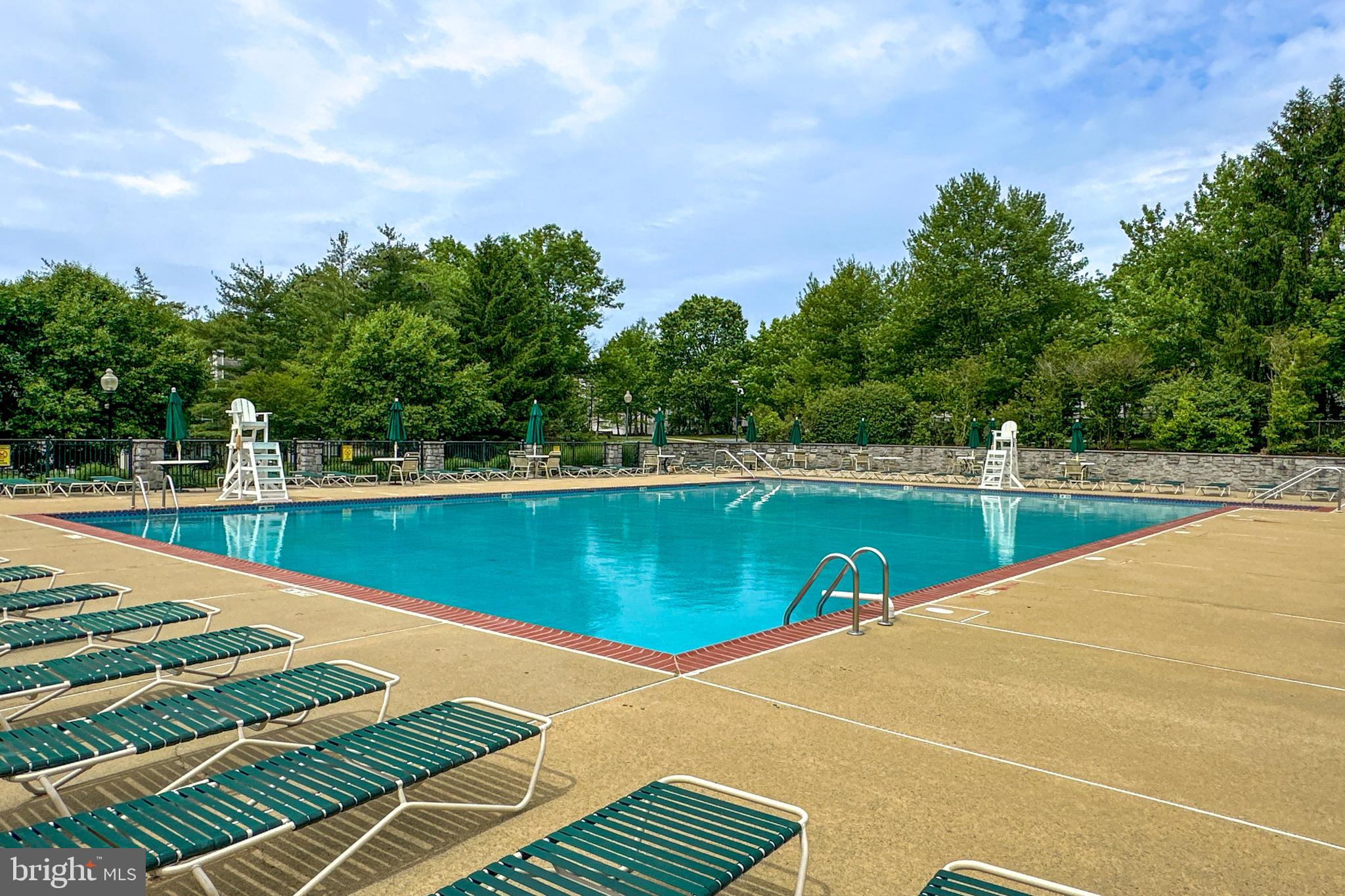 24 Foster Road Pennington, NJ 08534 - Photo 31 of 38 a view of a swimming pool with a yard