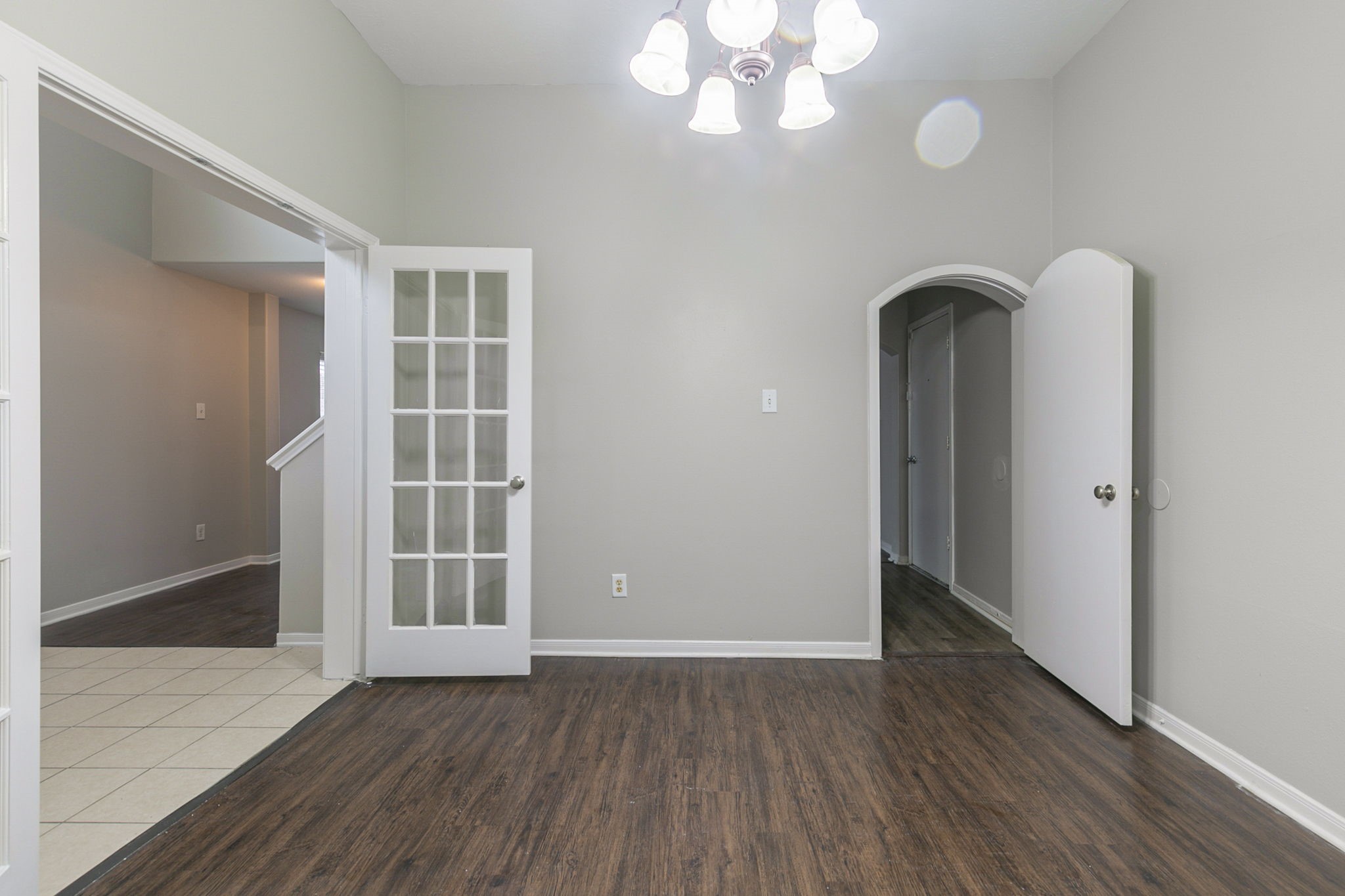 5601 Savannah Woods Lane Rosharon, TX 77583 - Photo 11 of 43 an empty room with wooden floor and windows