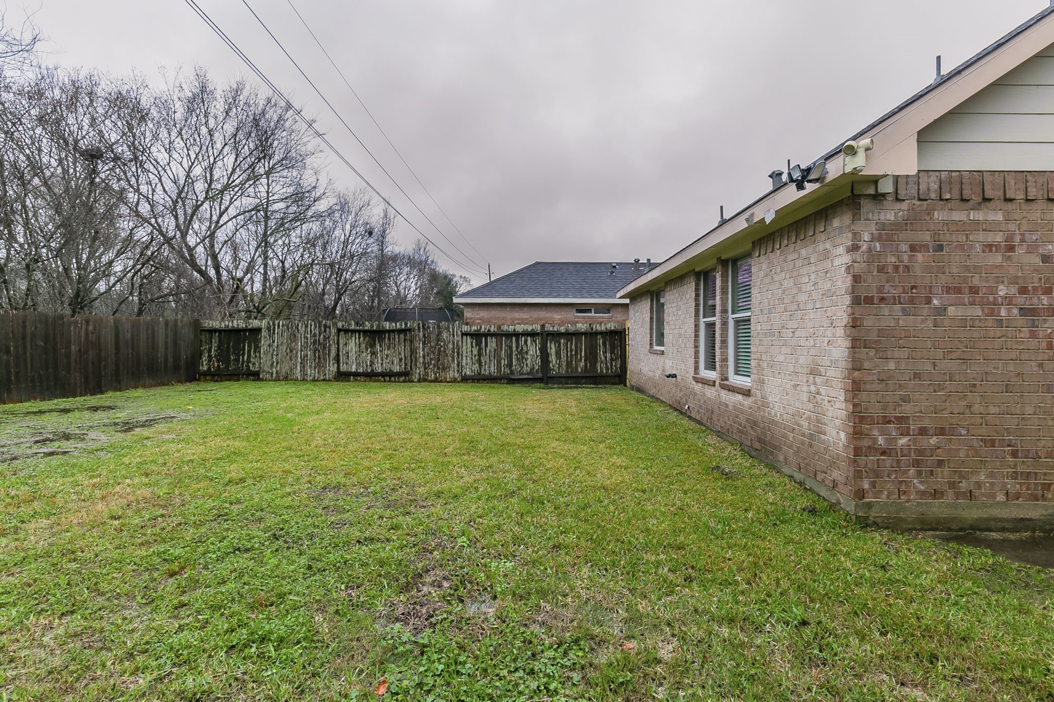 5601 Savannah Woods Lane Rosharon, TX 77583 - Photo 34 of 43 a view of a house with a backyard