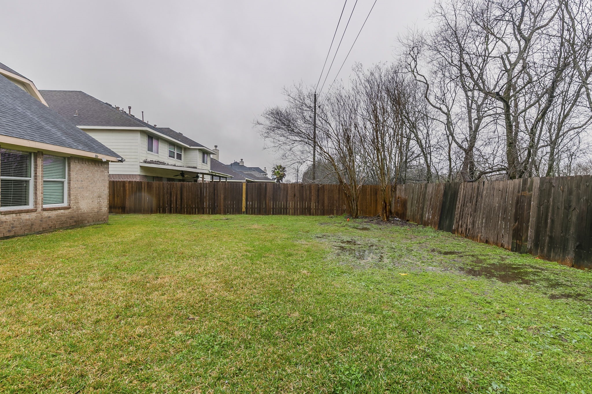 5601 Savannah Woods Lane Rosharon, TX 77583 - Photo 37 of 43 a front view of house with yard and green space