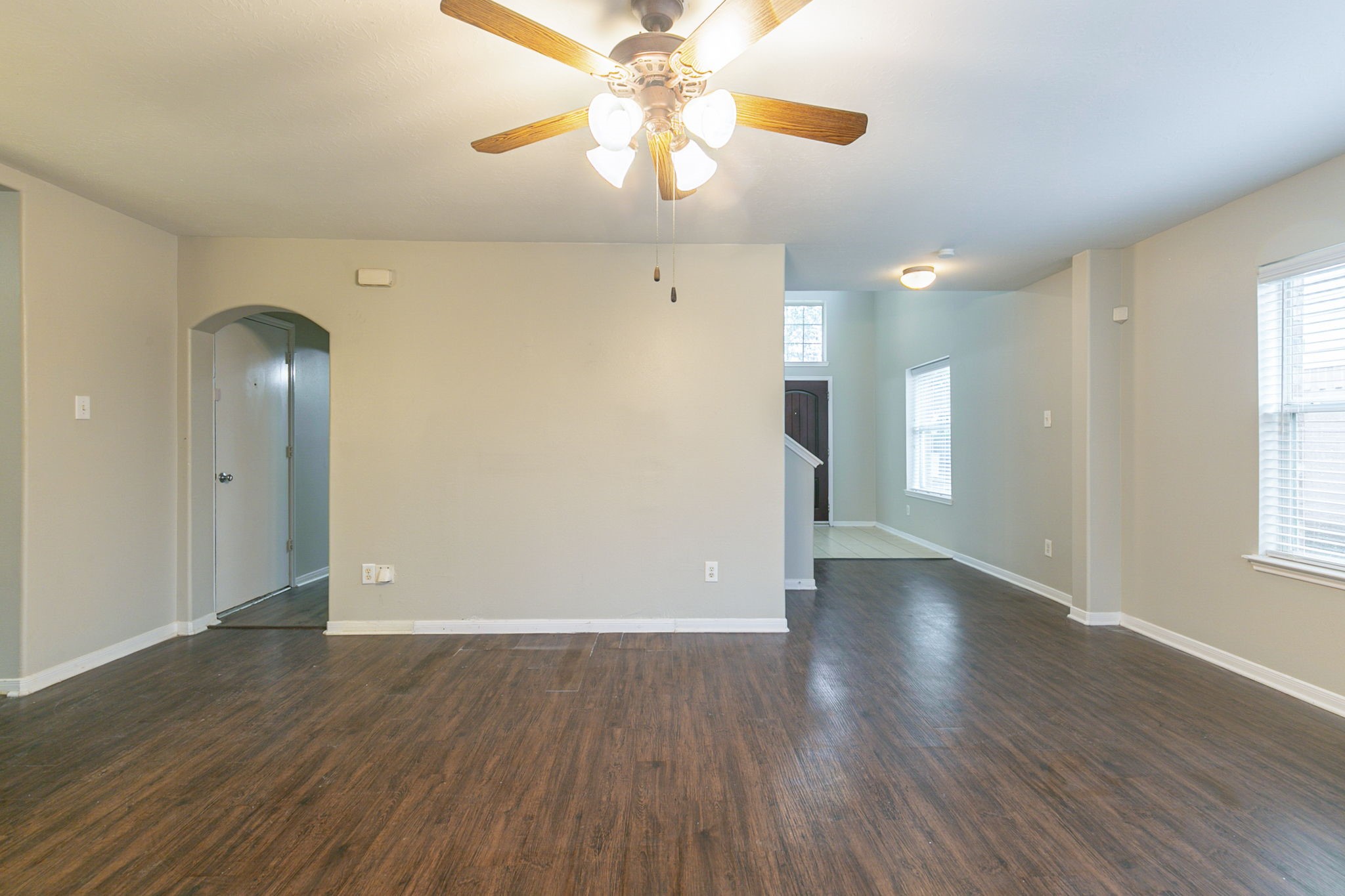 5601 Savannah Woods Lane Rosharon, TX 77583 - Photo 8 of 43 a view of an empty room with window and wooden floor