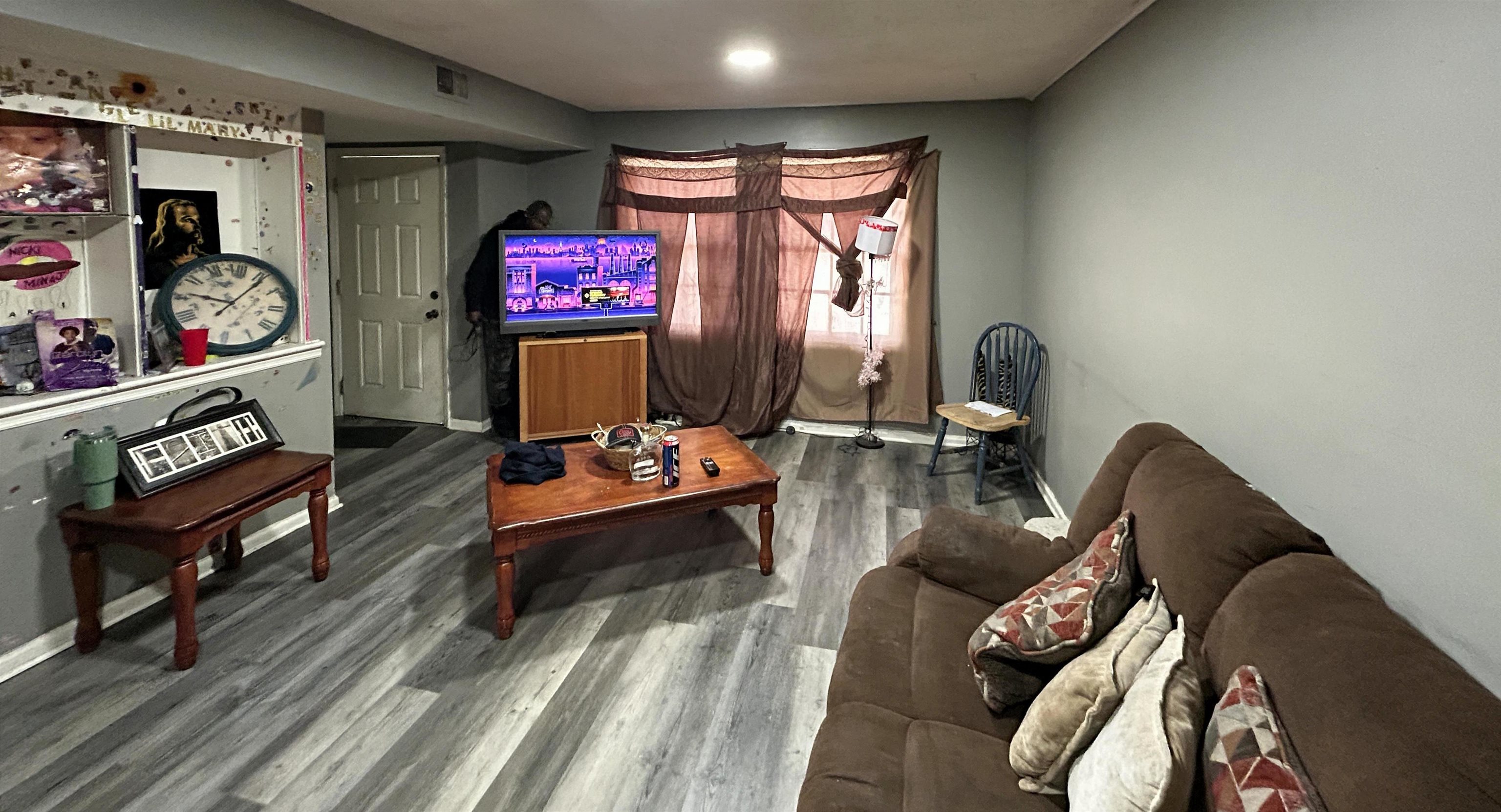 5237 Flowering Peach Drive Memphis, TN 38115 - Photo 3 of 15 a living room with furniture and a flat screen tv