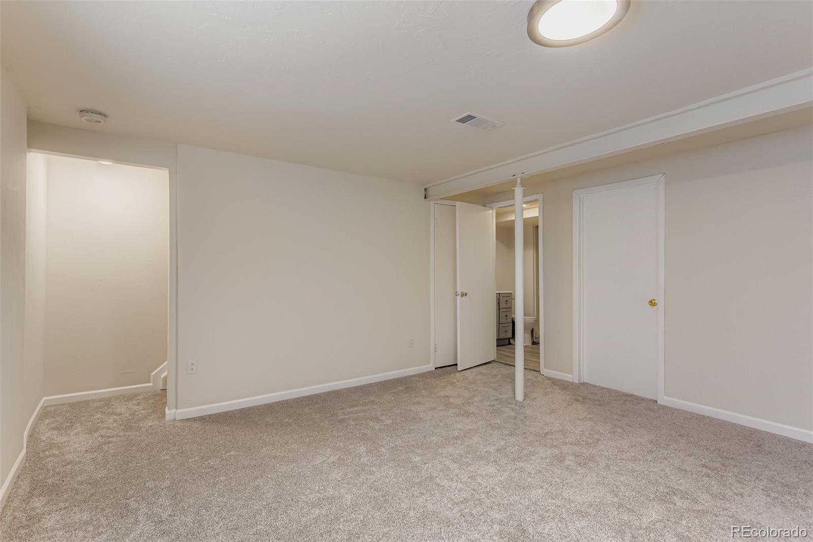 9510 Joyce Lane Highlands Ranch, CO 80126 - Photo 18 of 23 a view of an empty room