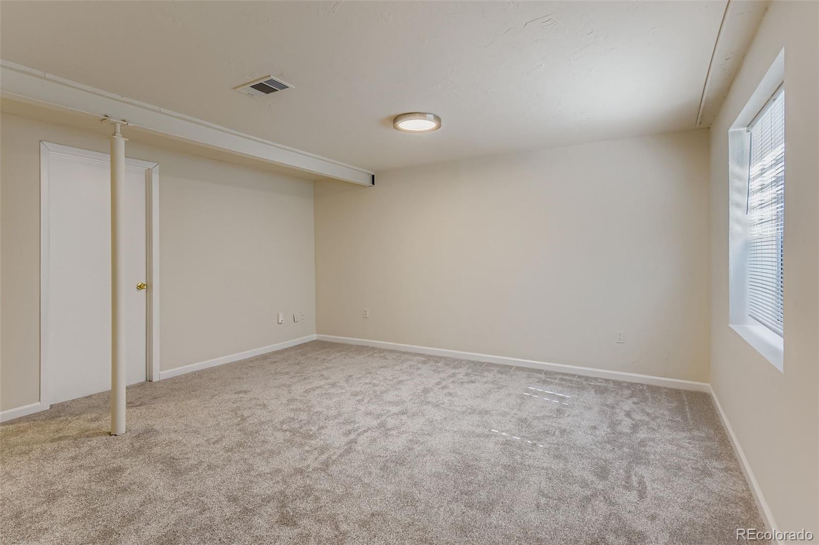 9510 Joyce Lane Highlands Ranch, CO 80126 - Photo 19 of 23 wooden floor in an empty room