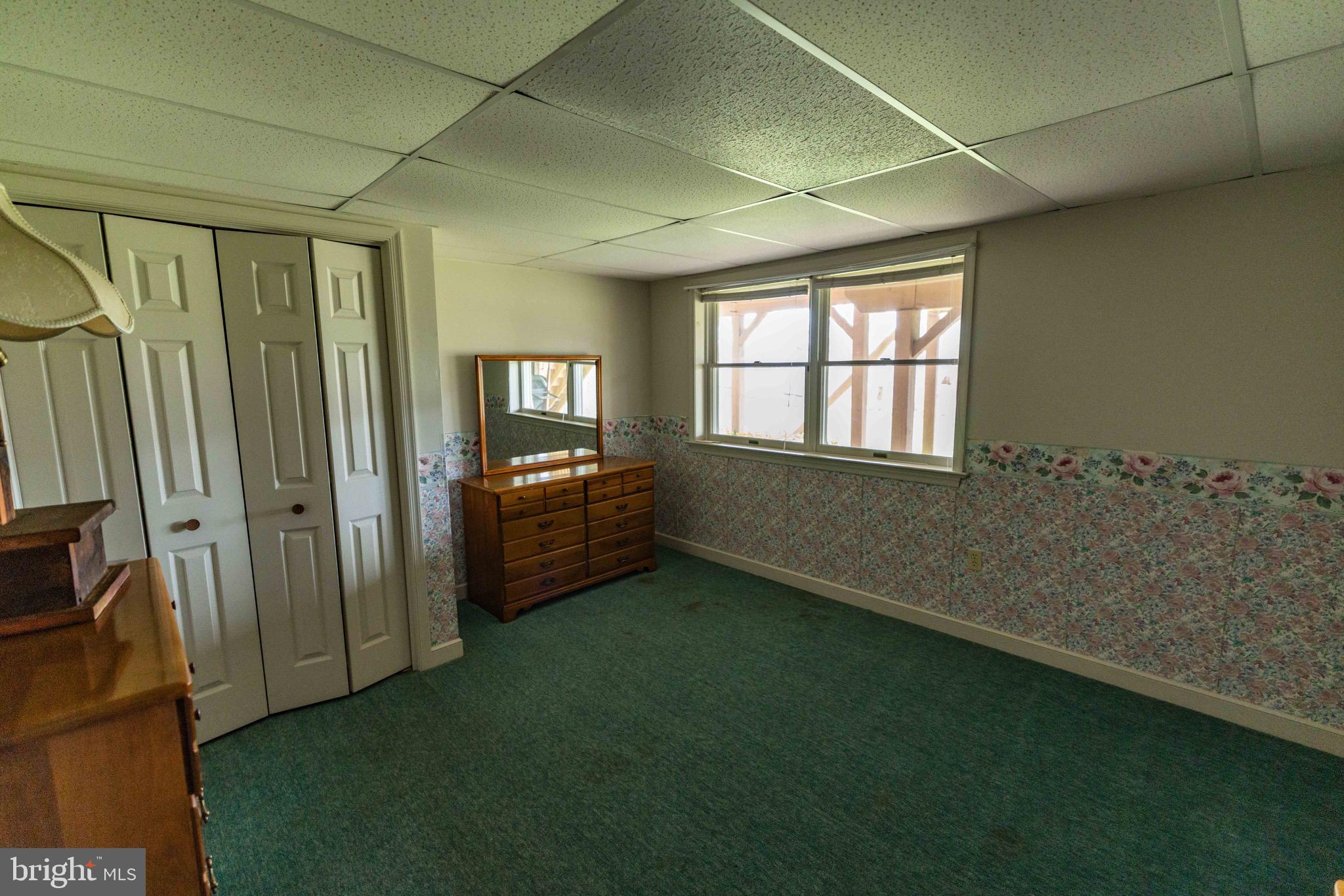 339 Churchtown Road Narvon, PA 17555 - Photo 104 of 150 a view of an empty room with a fireplace and a window