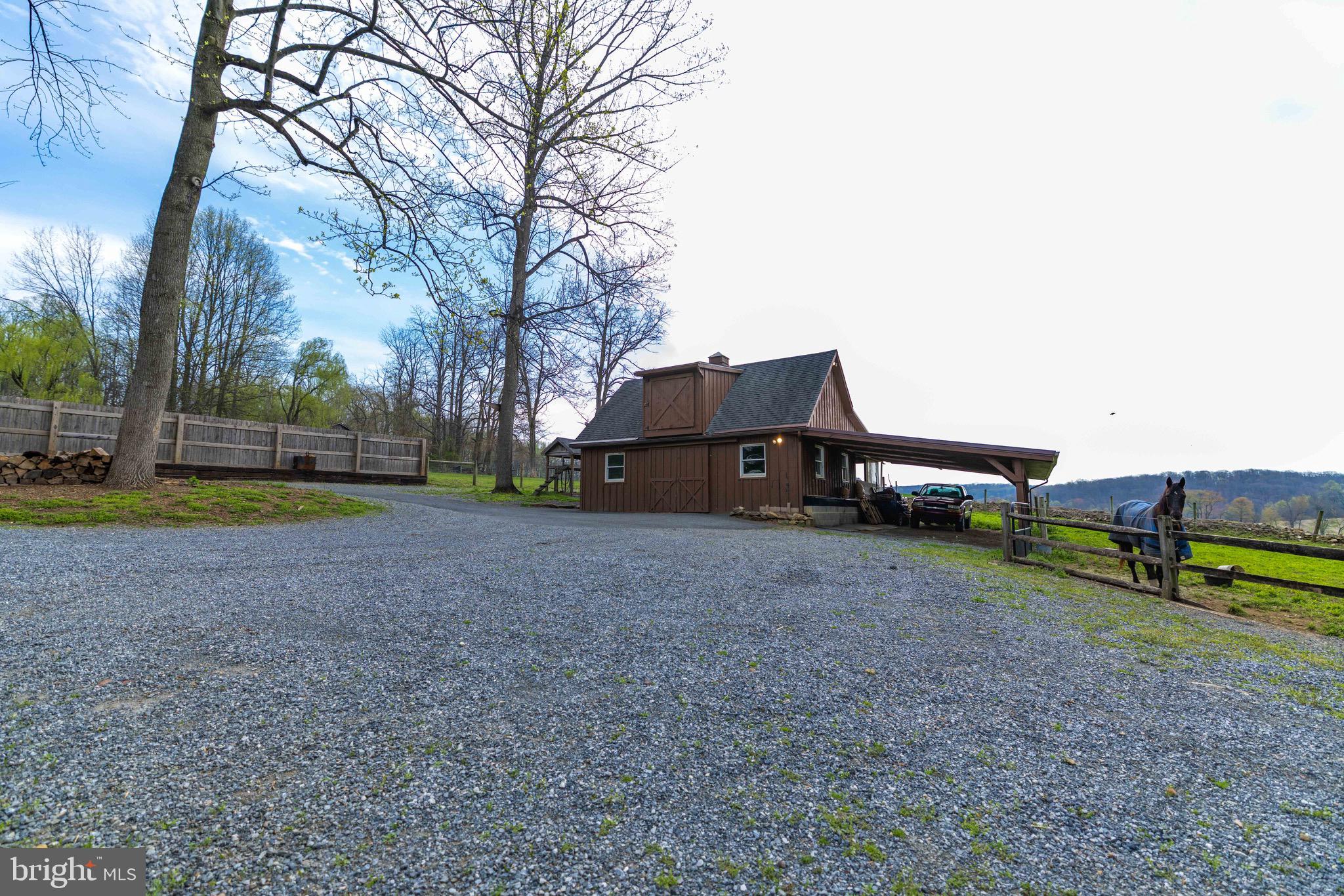 339 Churchtown Road Narvon, PA 17555 - Photo 19 of 150 a view of a house with a yard and a large tree