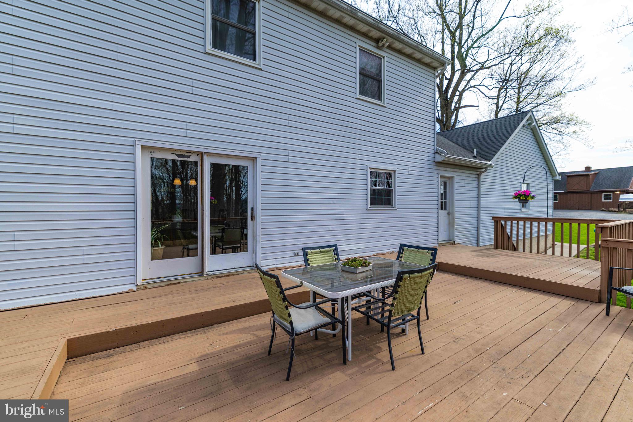 339 Churchtown Road Narvon, PA 17555 - Photo 36 of 150 a view of a house with a deck and a yard