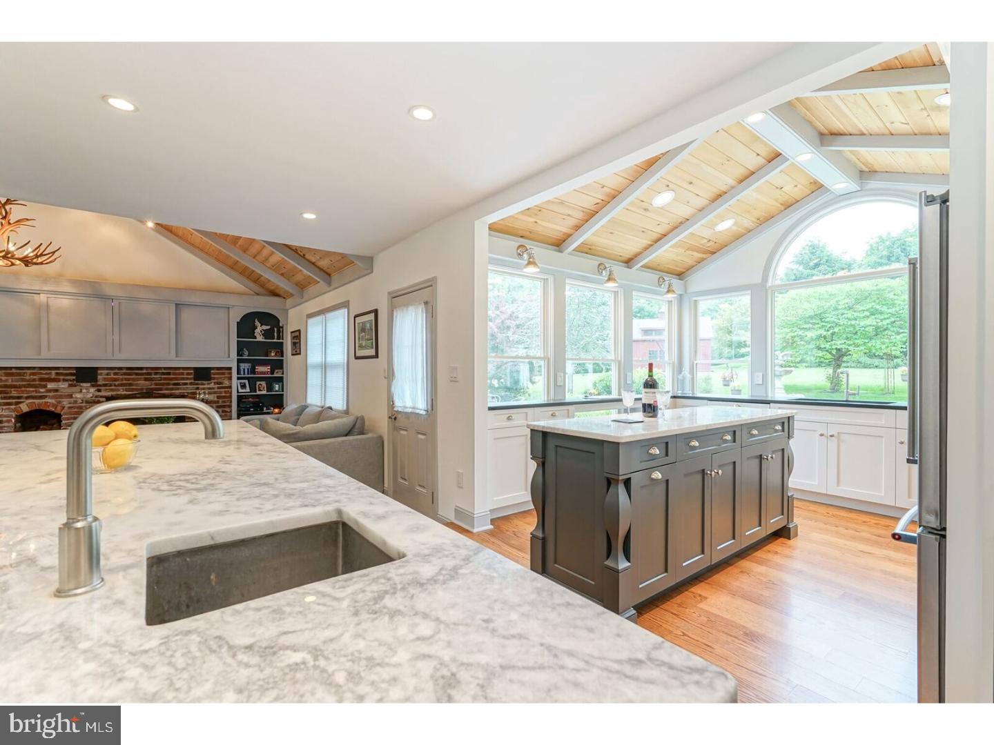85 Brownsburg Road Newtown, PA 18940 - Photo 2 of 25 a kitchen with stainless steel appliances granite countertop a sink and a stove
