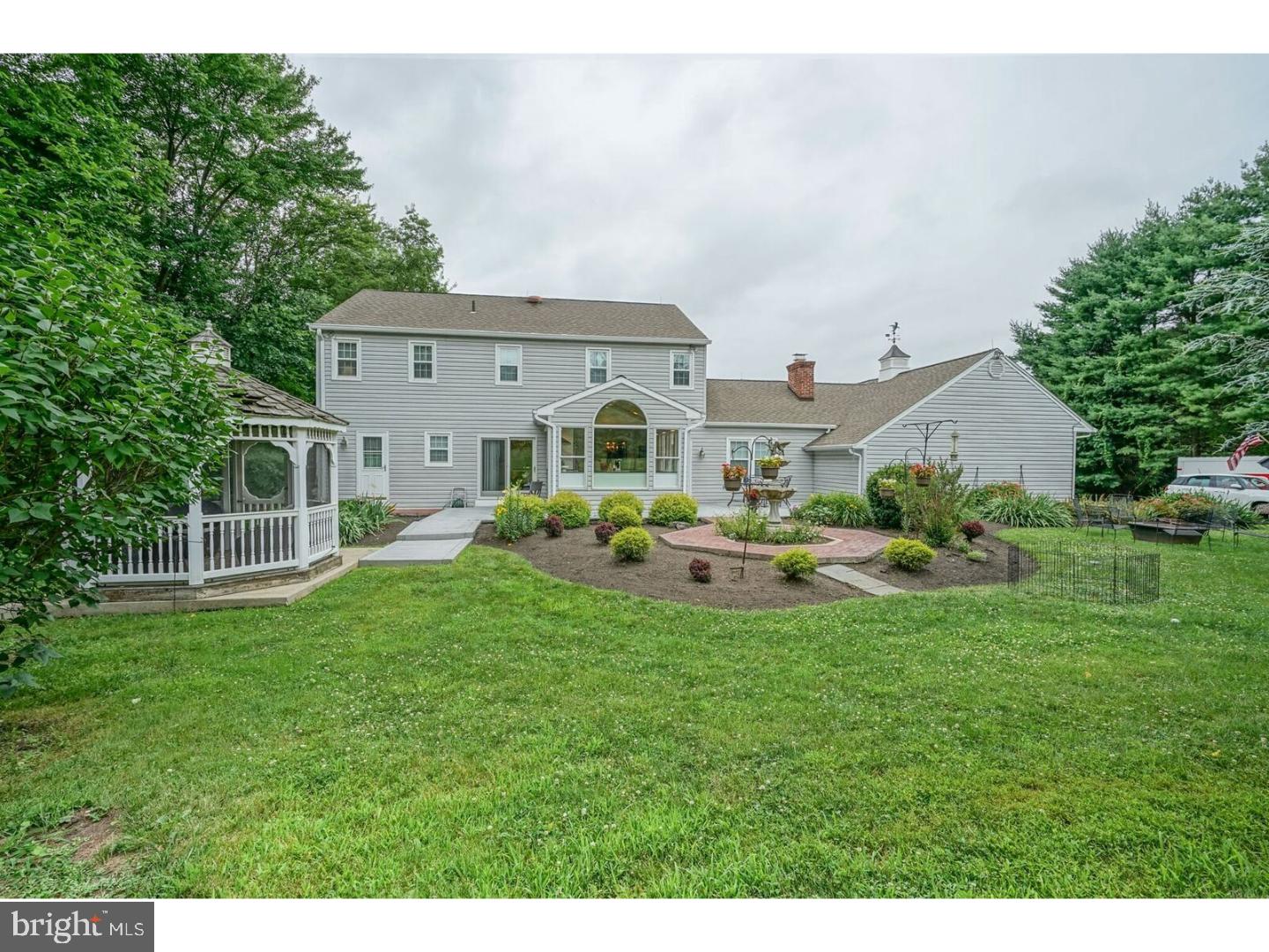85 Brownsburg Road Newtown, PA 18940 - Photo 20 of 25 a view of a house with a yard porch and sitting area