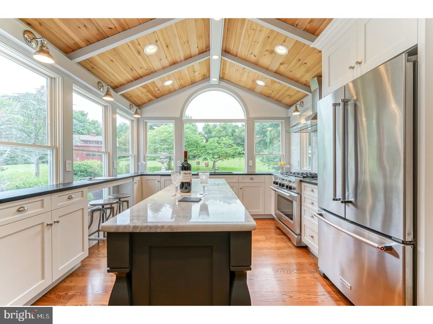 85 Brownsburg Road Newtown, PA 18940 - Photo 3 of 25 a kitchen with stainless steel appliances granite countertop a sink a stove and a refrigerator