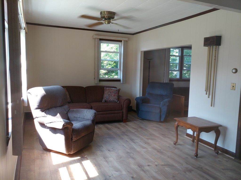 1723 Brayton Point Road Somerset, MA 02726 - Photo 8 of 30 a living room with furniture and a window