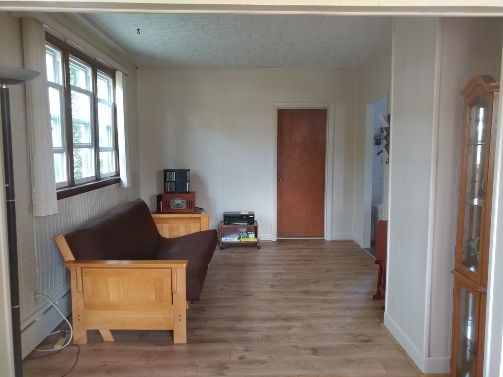 1723 Brayton Point Road Somerset, MA 02726 - Photo 10 of 30 a living room with furniture and a window