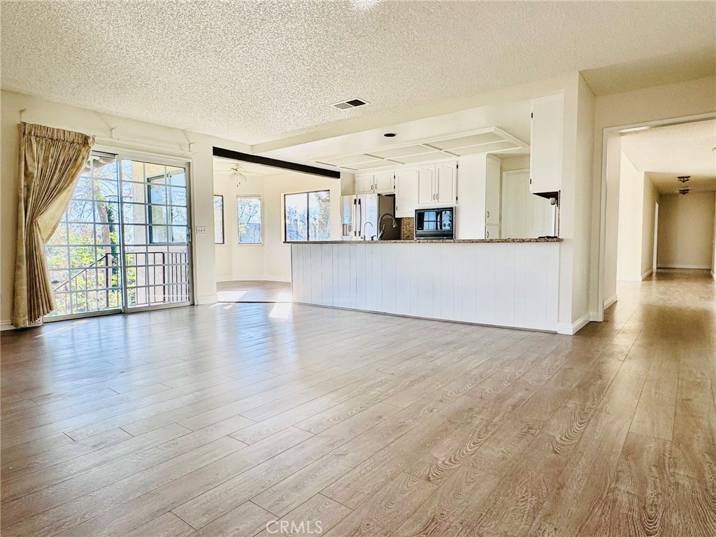 10983 Boulder Canyon Road Rancho Cucamonga, CA 91737 - Photo 10 of 41 Family Room with Open Concept Kitchen