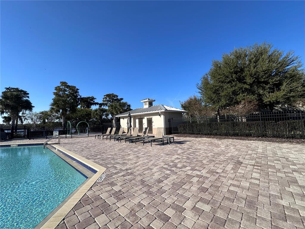 8552 Powder Ridge Trail Windermere, FL 34786 - Photo 29 of 30 a view of a house with a yard