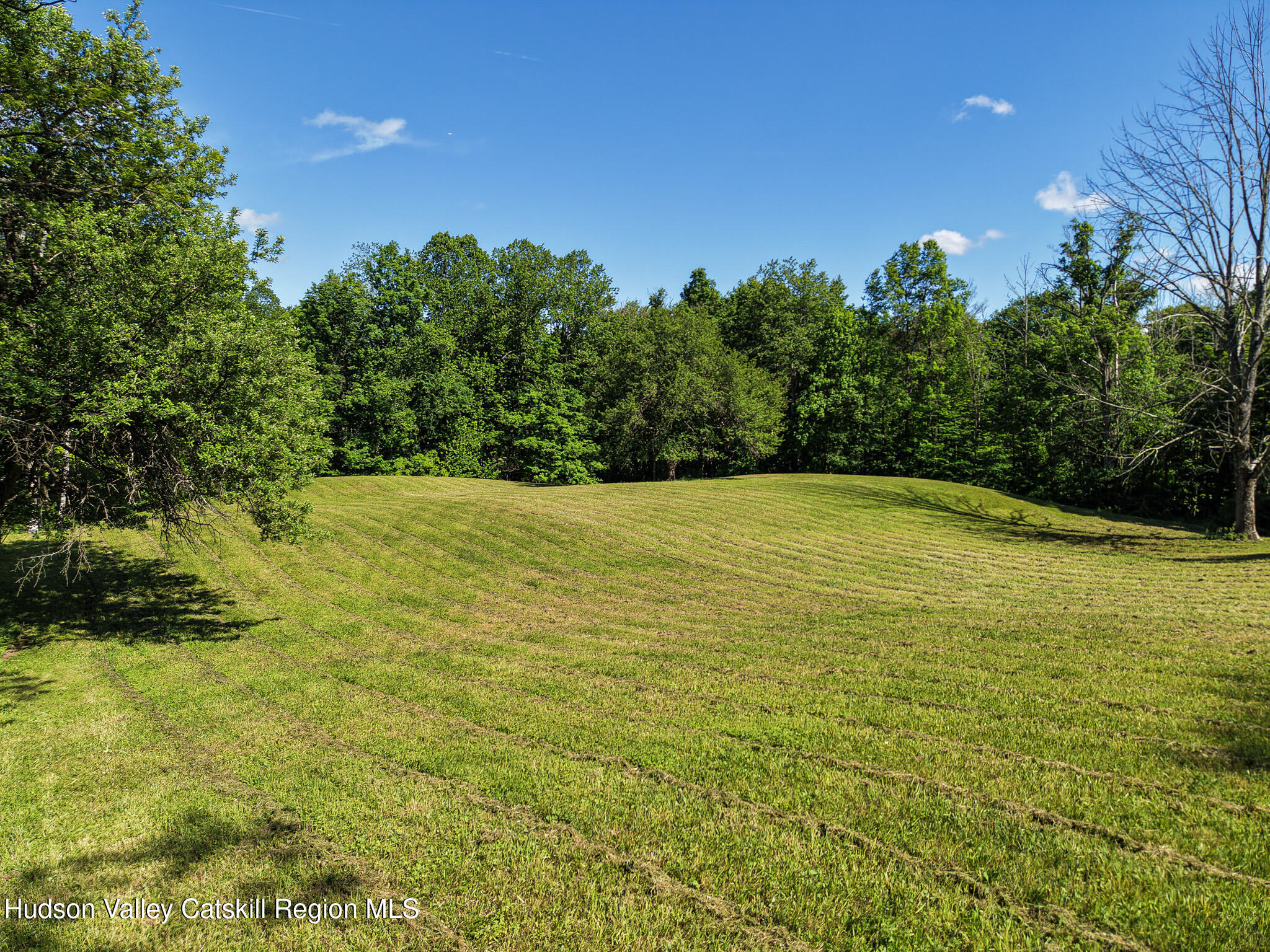 221 Camp Medusa Road Rensselaerville, NY 12120 - Photo 49 of 57 a view of a lake view with a outdoor space