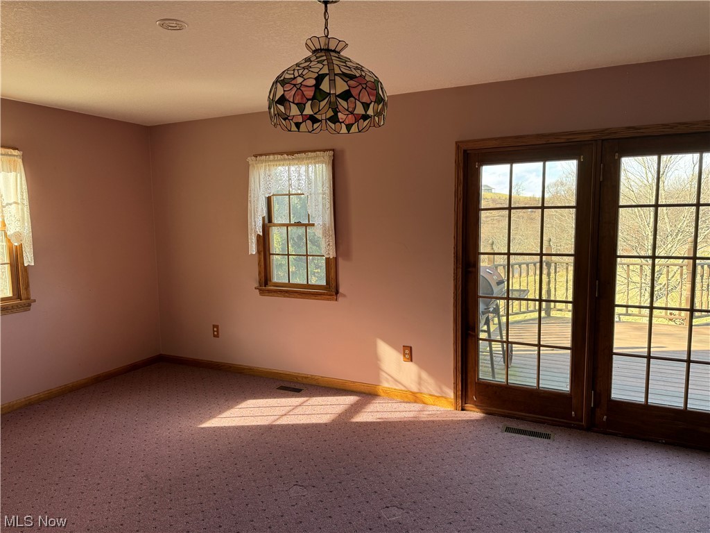 2812 Tabor Ridge Road Northeast Mineral City, OH 44656 - Photo 10 of 23 View of carpeted empty room