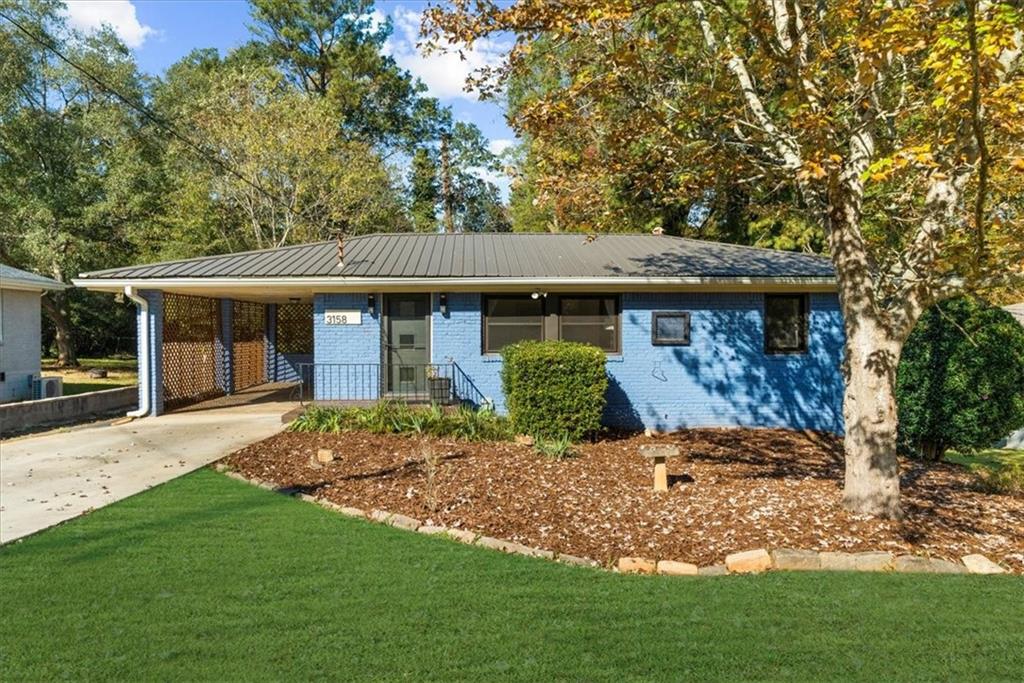 a view of a house with a garden