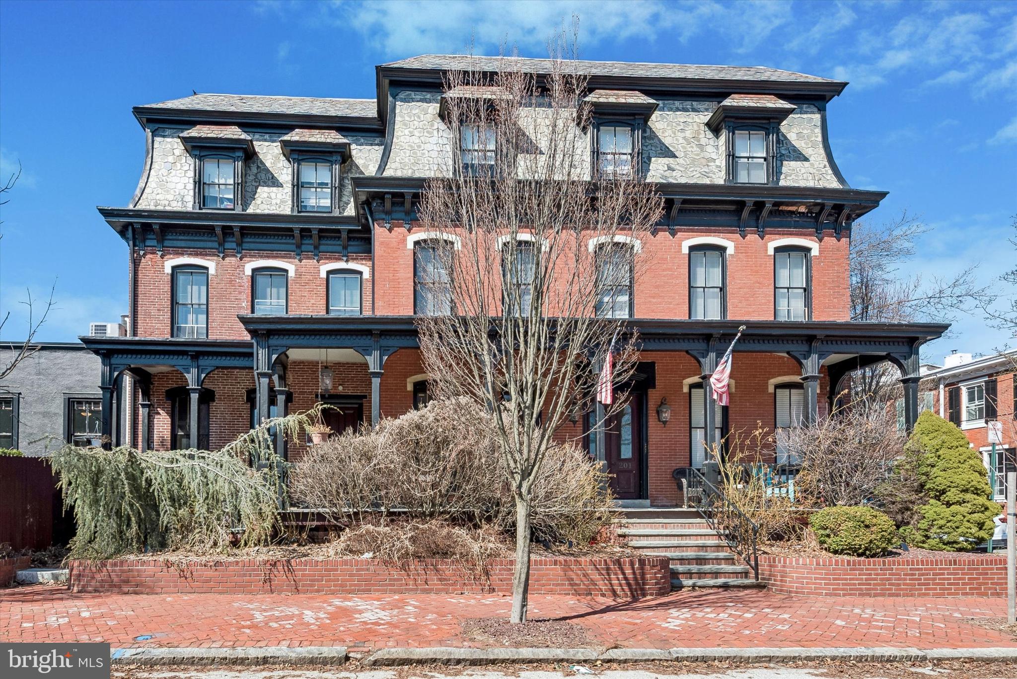 front view of a house with a small yard