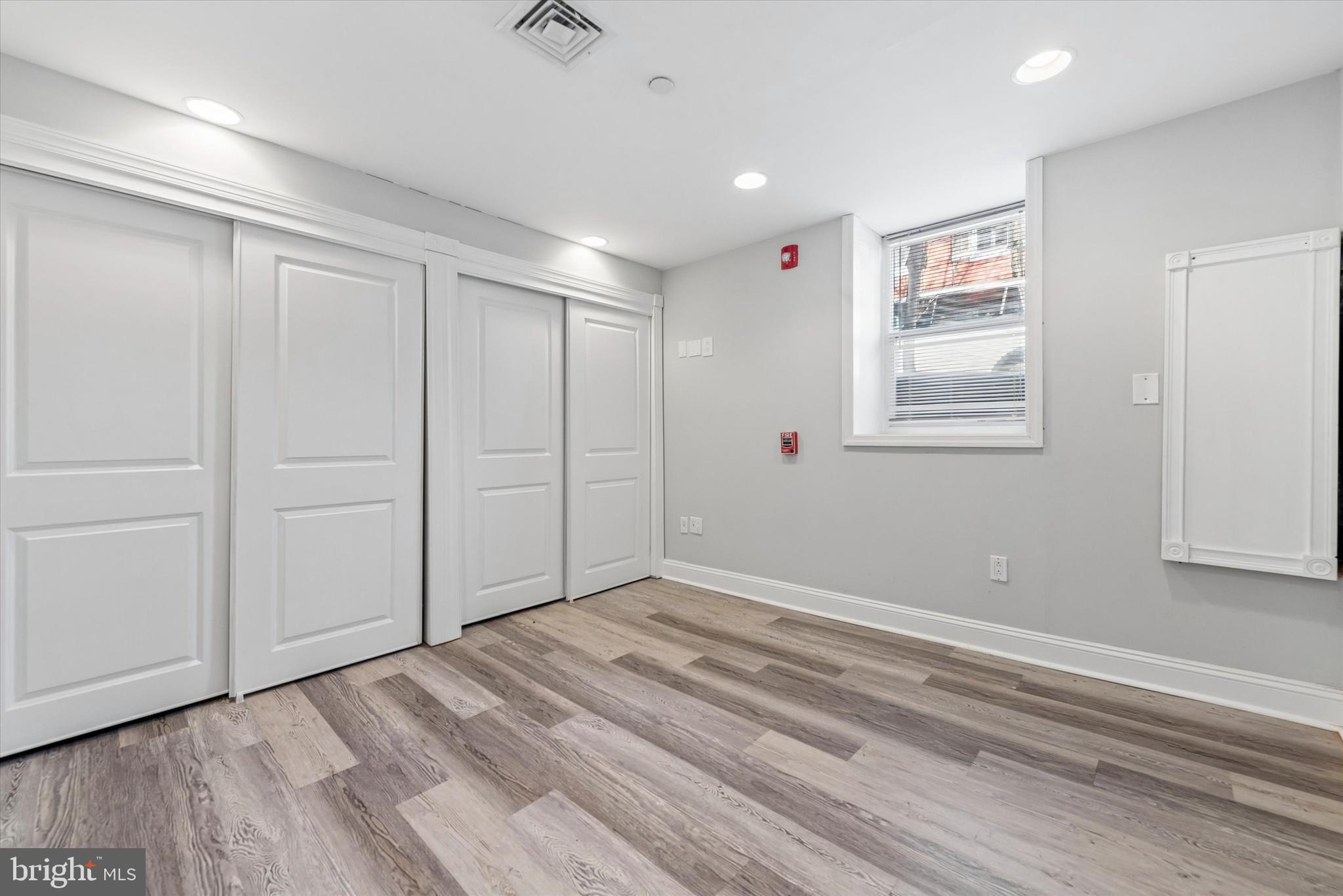 201 West Barnard Street, Unit 2 West Chester, PA 19382 - Photo 11 of 19 a view of empty room with wooden floor