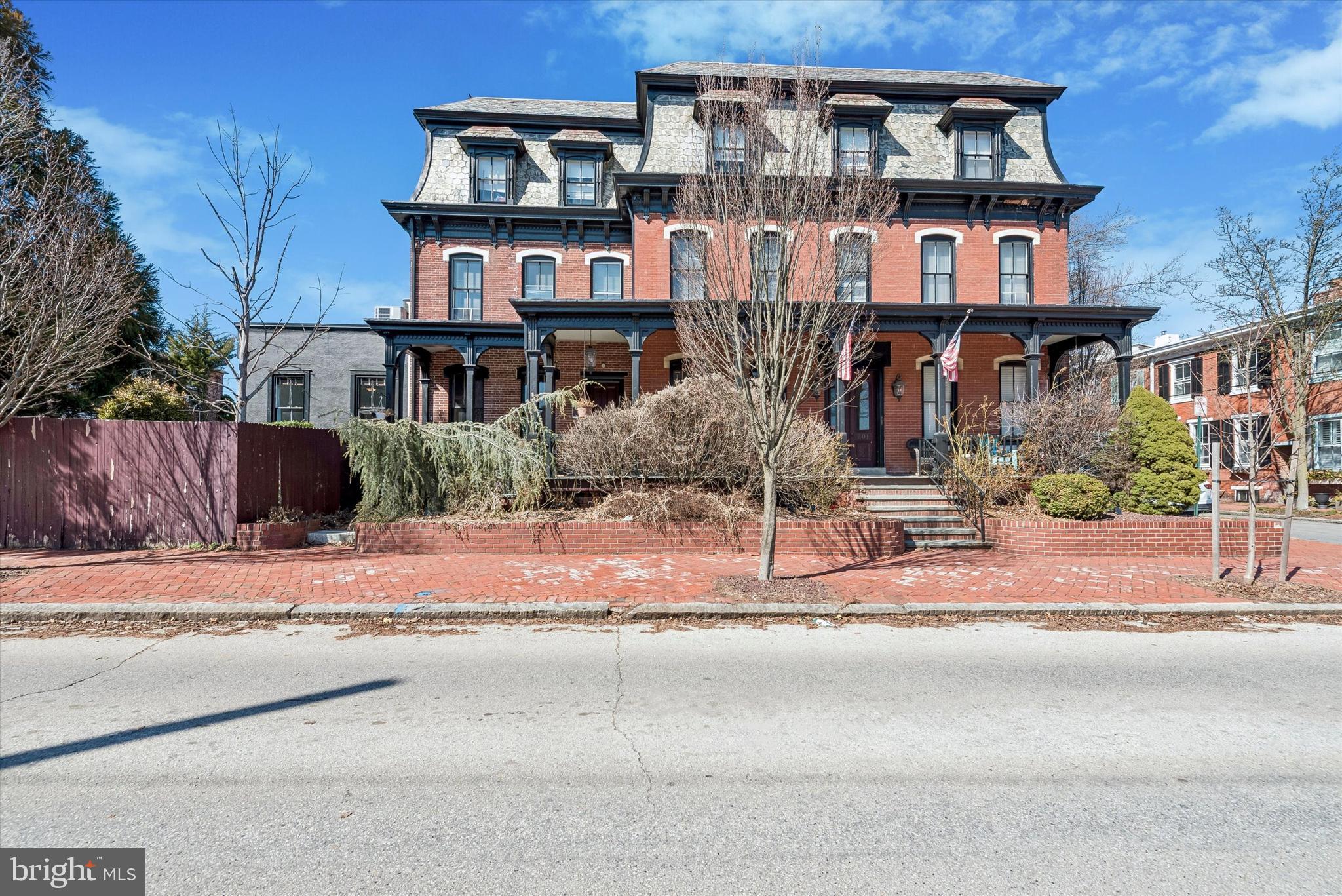 201 West Barnard Street, Unit 2 West Chester, PA 19382 - Photo 2 of 19 a front view of a house with a yard