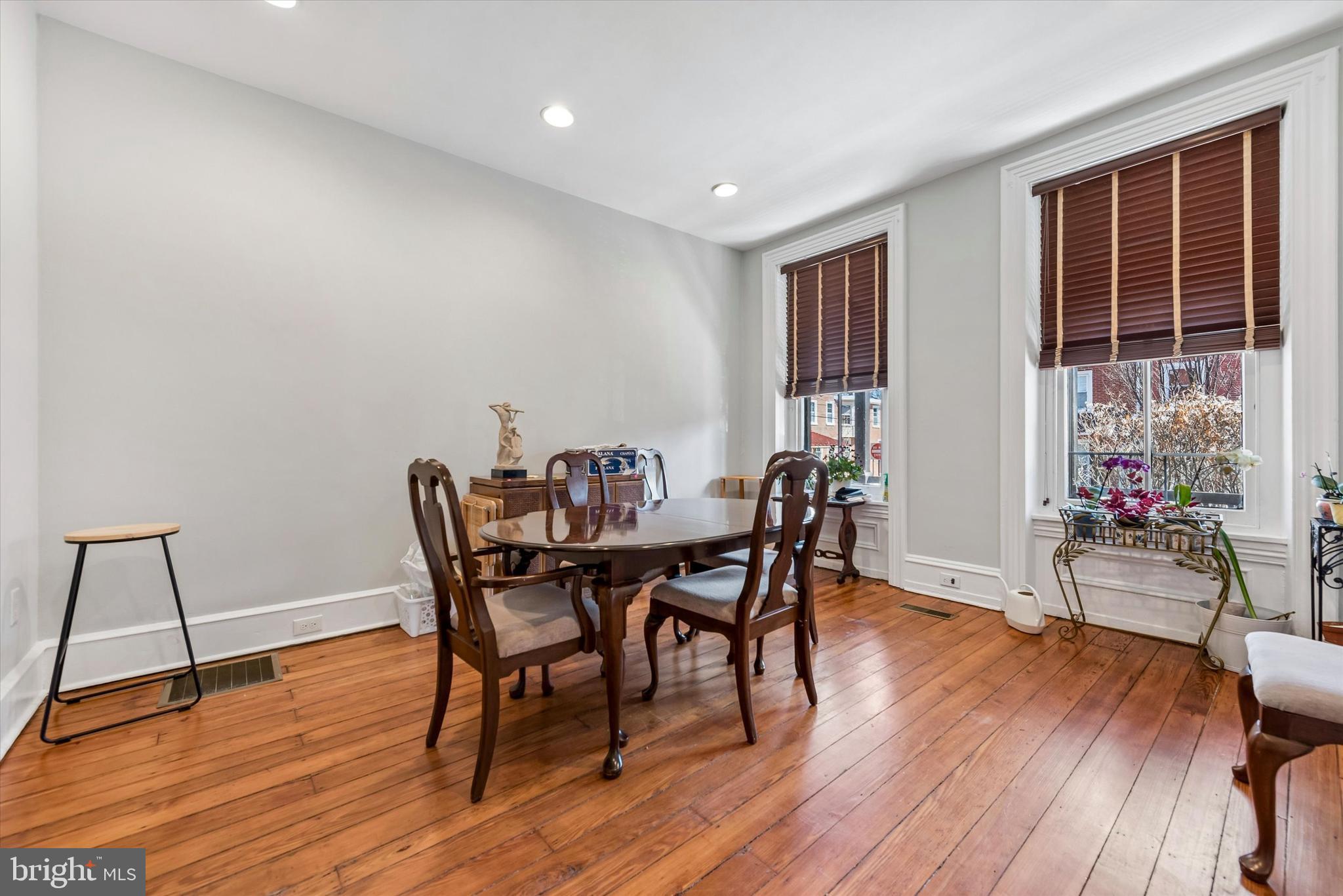 201 West Barnard Street, Unit 2 West Chester, PA 19382 - Photo 6 of 19 a view of a dining room with furniture and wooden floor
