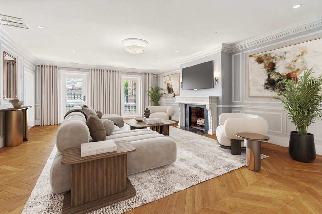 150 Beacon Street, Unit PH Boston, MA 02116 - Photo 5 of 24 a living room with furniture a fireplace and a large window