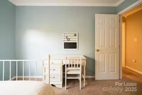 a view of a hallway with entryway door