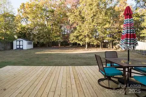 a view of a chairs and tables in the patio