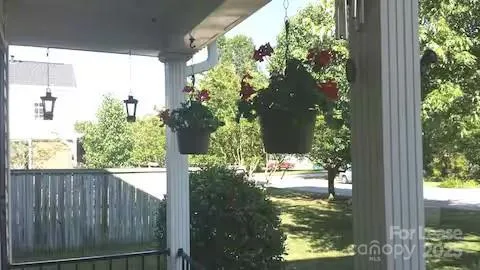 a view of a yard from a balcony