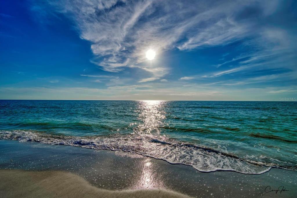 1206 Gulf Boulevard, Unit A6 Indian Rocks Beach, FL 33785 - Photo 16 of 61 a view of a lake with a big yard