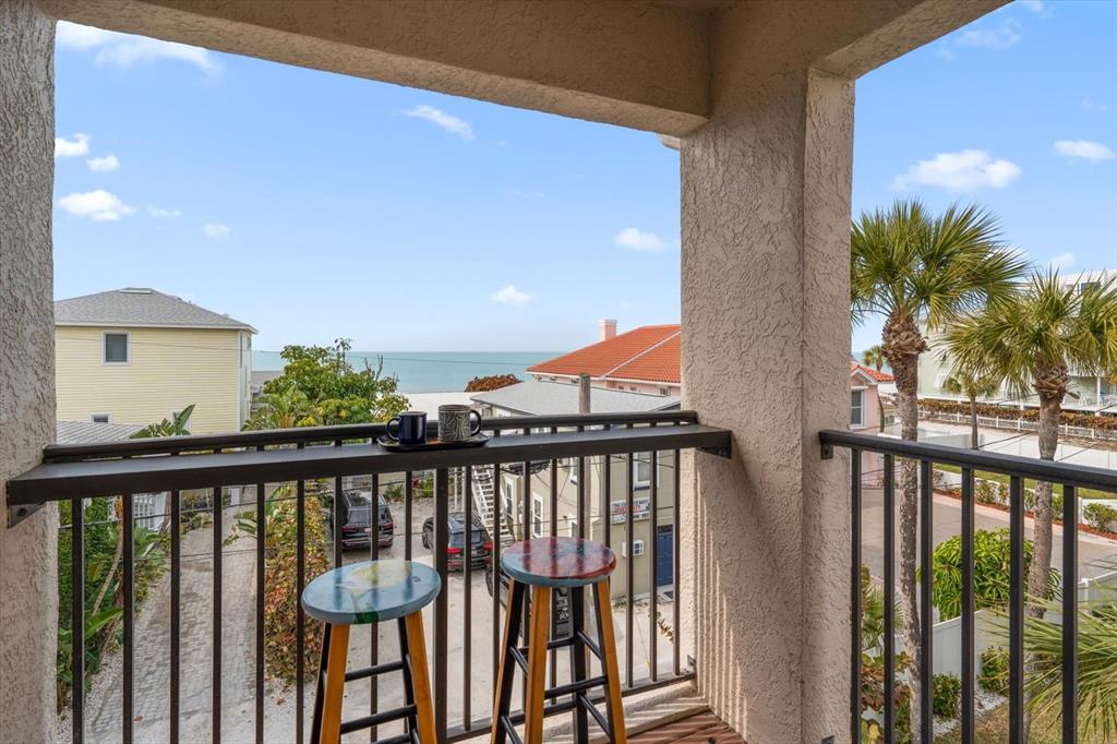 1206 Gulf Boulevard, Unit A6 Indian Rocks Beach, FL 33785 - Photo 42 of 61 a view of a balcony with an outdoor space