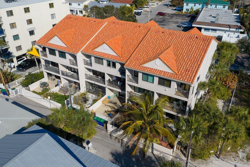 1206 Gulf Boulevard, Unit A6 Indian Rocks Beach, FL 33785 - Photo 51 of 61 an aerial view of residential houses with street