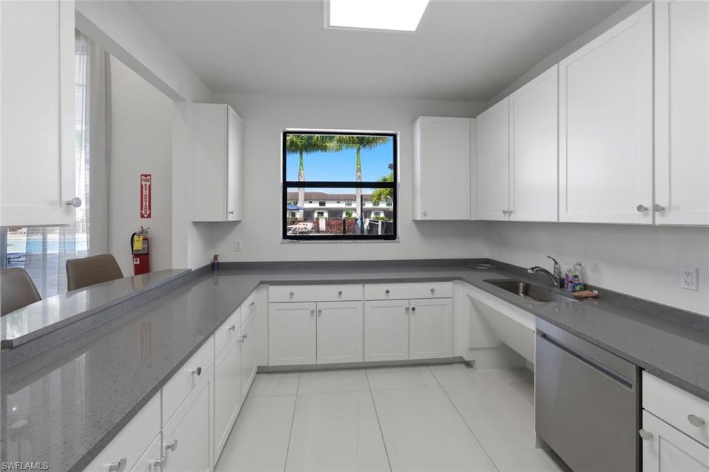 7345 Rockefeller Drive Naples, FL 34119 - Photo 40 of 42 Clubhouse kitchen