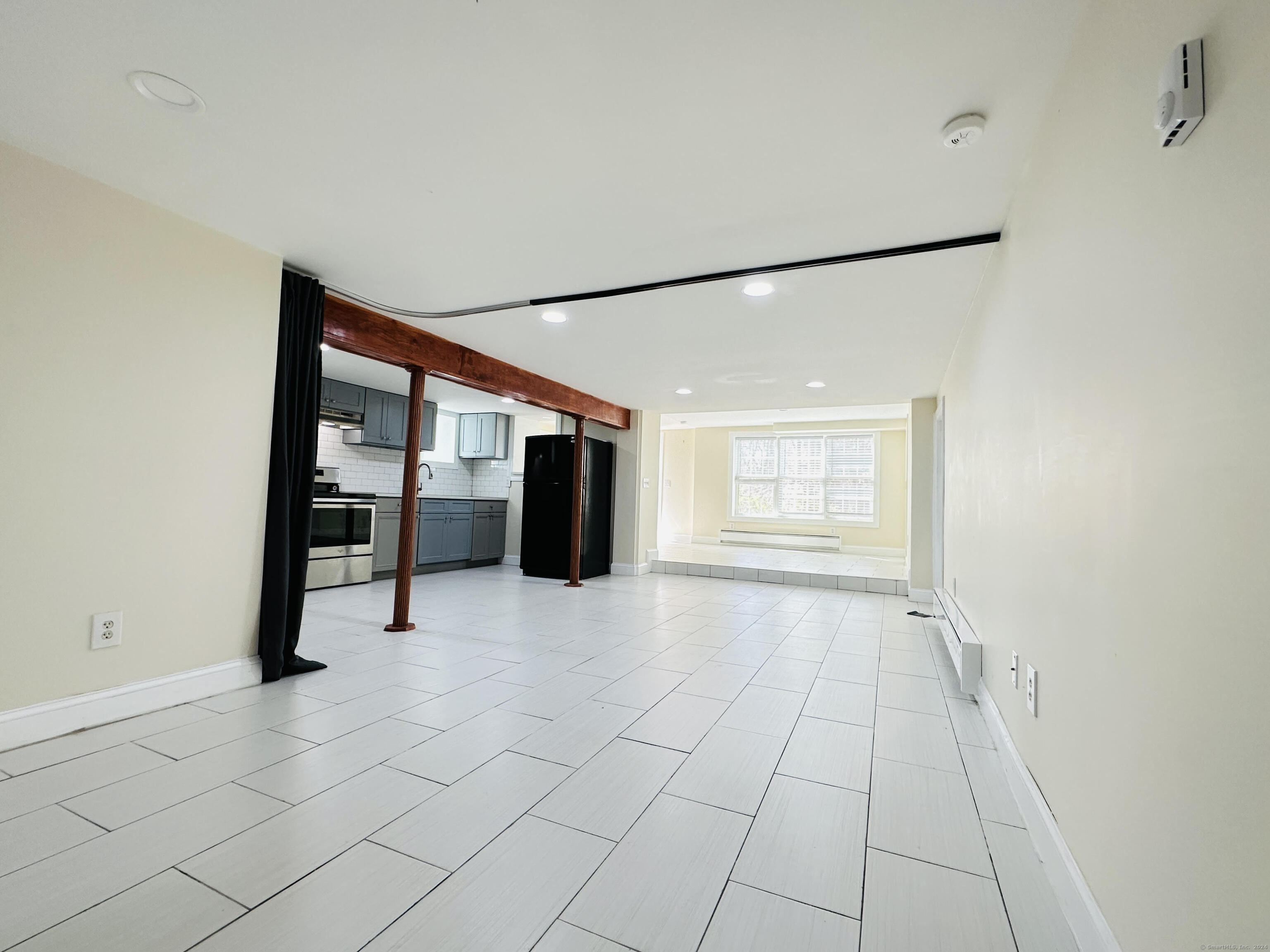 31 Brainerd Road Branford, CT 06405 - Photo 15 of 15 a view of an empty room with a window