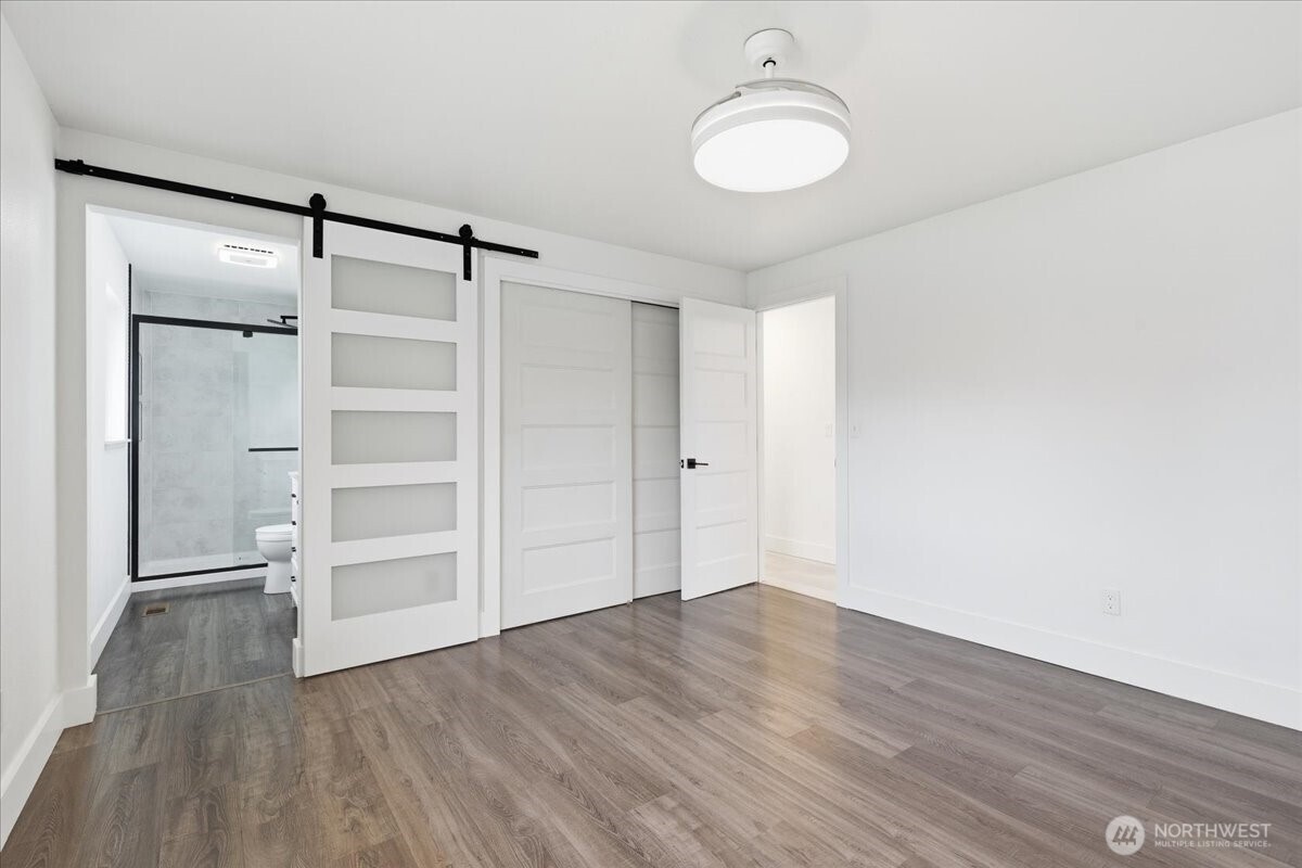 216 Sandy Lane Electric City, WA 99123 - Photo 17 of 40 a view of walk in closet with empty racks