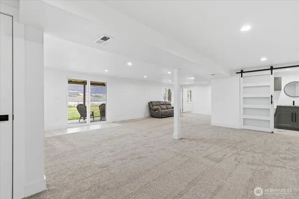 a view of a livingroom with a staircase