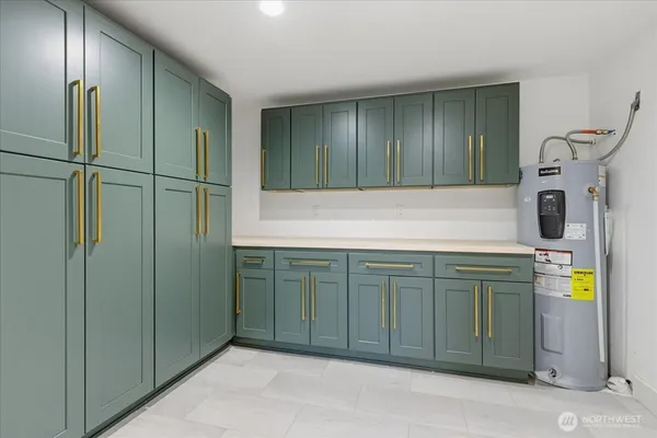 a bathroom with a shower and a sink