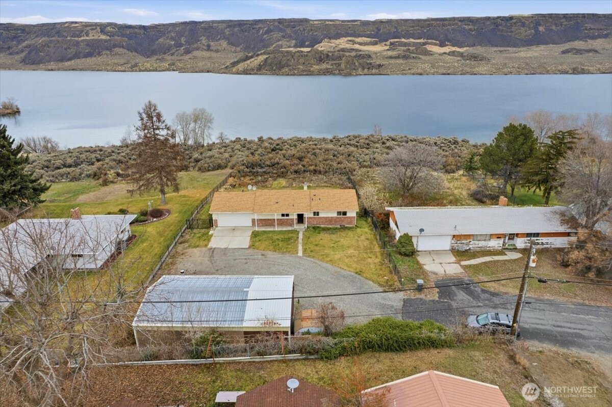 216 Sandy Lane Electric City, WA 99123 - Photo 38 of 40 an aerial view of a house with a lake view