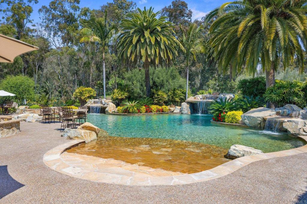 6314 El Apajo Rancho Santa Fe, CA 92067 - Photo 11 of 60 a view of a backyard with swimming pool
