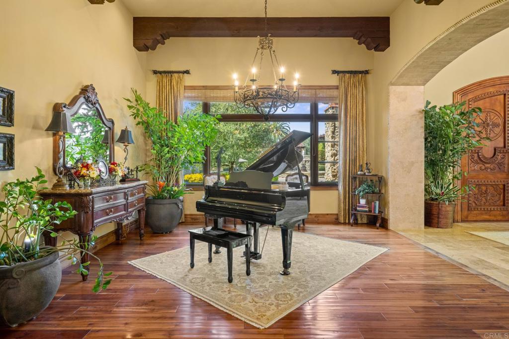 6314 El Apajo Rancho Santa Fe, CA 92067 - Photo 15 of 60 a patio with table and chairs