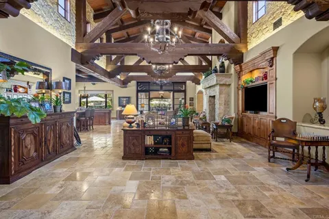 a kitchen with stainless steel appliances granite countertop a stove and a sink