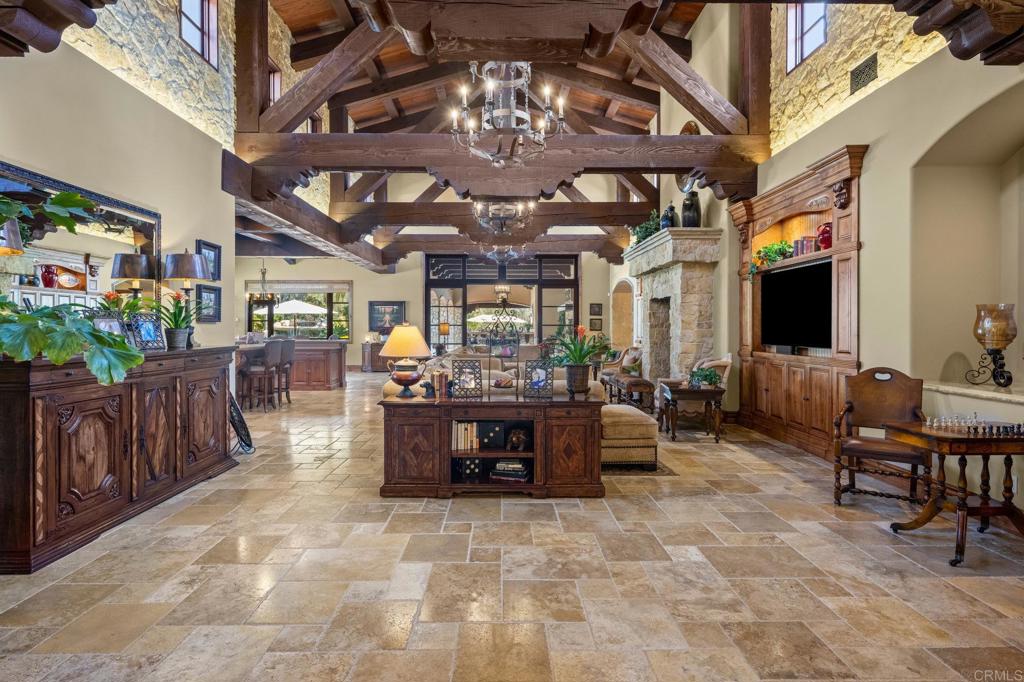 6314 El Apajo Rancho Santa Fe, CA 92067 - Photo 23 of 60 a view of a dining room with furniture