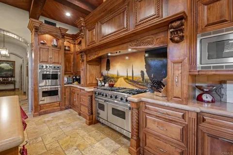 a lobby with furniture and a potted plant