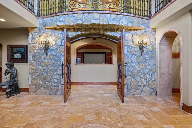 a view of swimming pool with a table and chairs