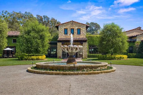 a view of a swimming pool with a garden