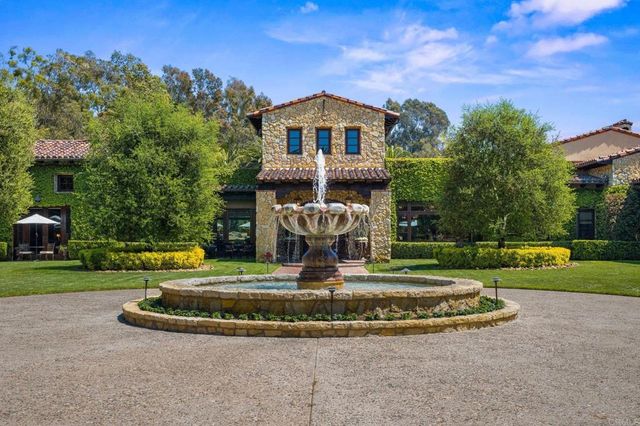a view of a swimming pool with a garden