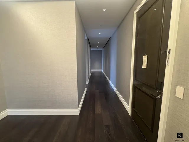 a view of hallway with stairs