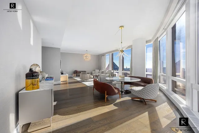 a view of a living room and dining room