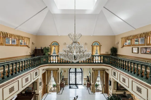 a view of a swimming pool with a chandelier
