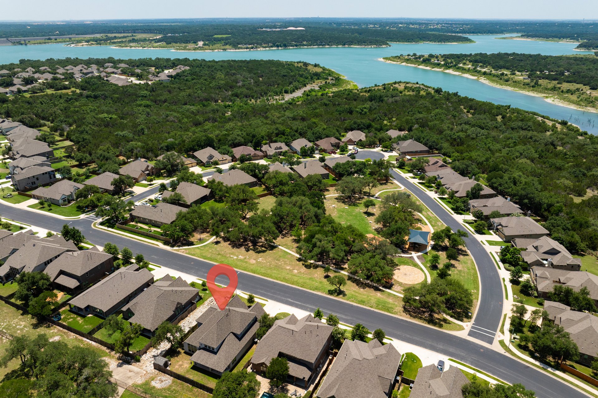 1513 Lakeside Ranch Road Georgetown, TX 78633 - Photo 2 of 40 Aerial view of residential area featuring a nearby body of water